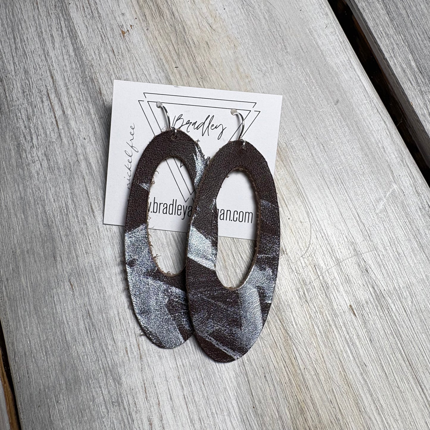 Silver Graffiti Style Leather Earring Collection
