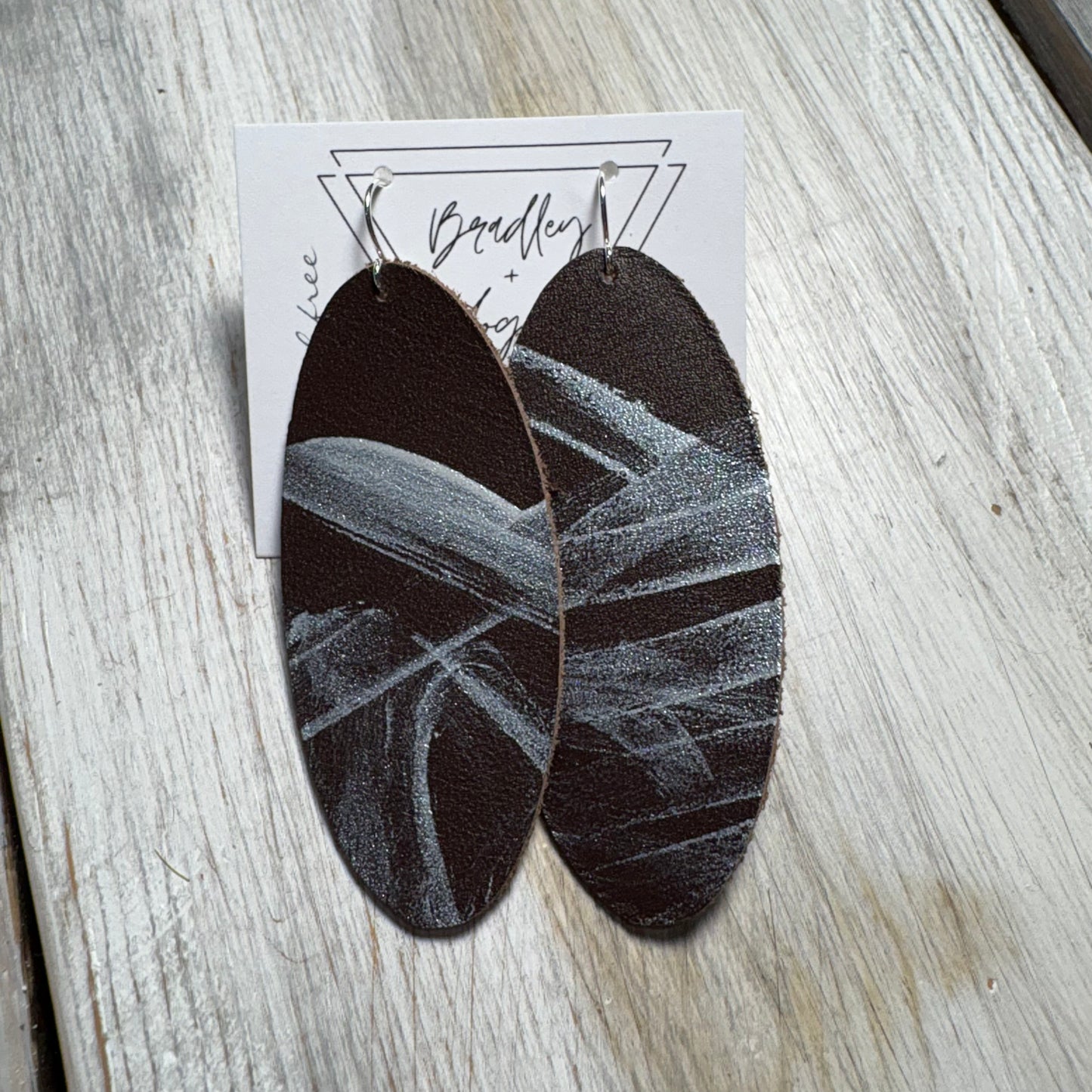 Silver Graffiti Style Leather Earring Collection